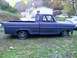 2002 Ford Crown Victoria - This pickup truck, likely a 1967 Ford F-100, is shown in a side profile with a lowered stance and aftermarket wheels.