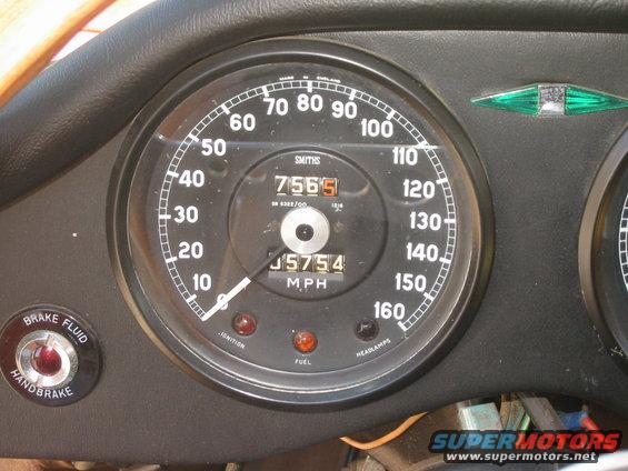 Smiths speedometer and odometer from a Jaguar XKE, showing 7565 miles