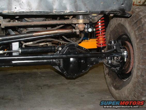 Rear axle and red coil spring suspension on off-road vehicle
