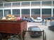 2006 Volkswagen GTI - Cars gathered outside a building, including multiple yellow Volkswagen Golfs and other vehicles.