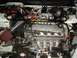 1997 Ford Probe - The engine bay shows a "HONDA" engine and a "NEUSPEED" branded strut bar.