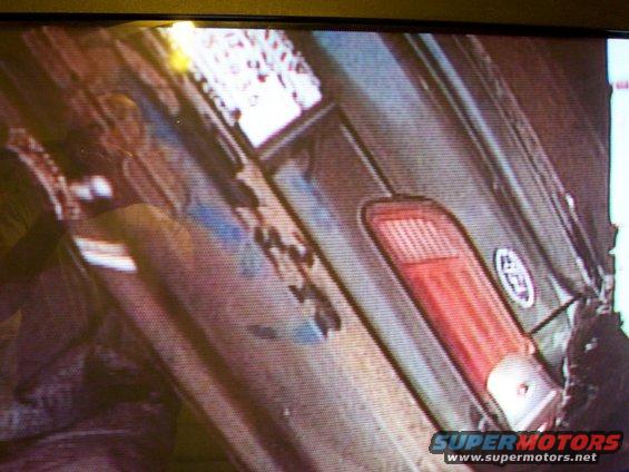 100_0198.jpg Look closely at the rear bumper. He had just bought this and it wasn't tagged yet.