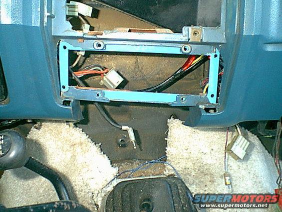 ac-mount.jpg Here is the adapter mount in the install lacation.to clear up why i chopped out the dash it was to keep from chopping up the control panel ears. 