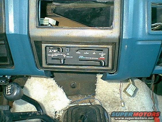 ac-controls-installed.jpg Here it is with the cover over it. looks factory and like it came this way.