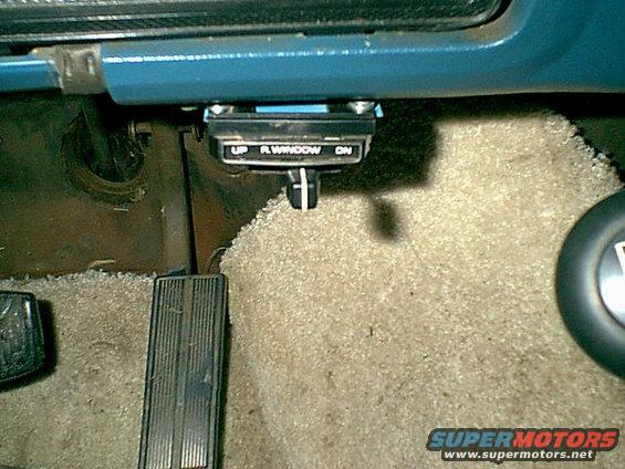 rearwindowswitch.jpg Here is is from the drivers seat.. almost looks like it came this way.