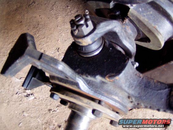 Front axle assembly with ball joint and tie rod end