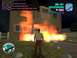 1990 Ford Probe - A house is engulfed in flames in this video game screenshot, with a character observing the scene.