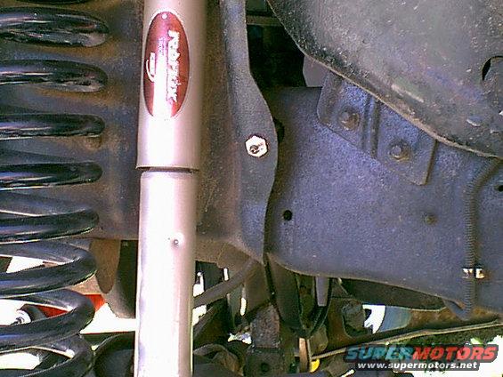 anadapter.jpg To get the new lines to work with the bronco i needed to install AN adapters. on the drivers side frame i removed the rubber flex line from the hard line and installed this AN adapter. i put a new clip on the back of the fitting.