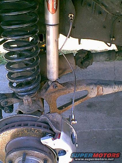 new-lines.jpg I put the caliper back on and installed the line