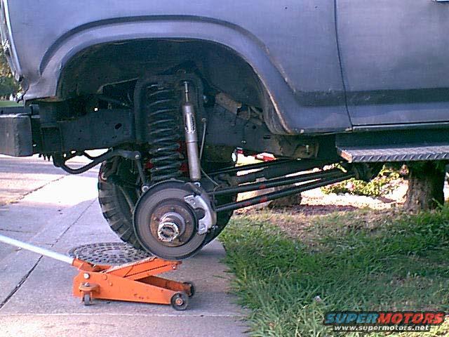 aswestarted.jpg Ok the wheel is off. I was lazy here please put a Jack stand under the frame or front axle do not work on the jack as i did. I have had jacks fail. 