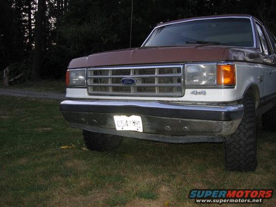1987 Ford Bronco front view with "4x4" badge and license plate