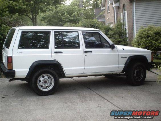 White Jeep Cherokee side view