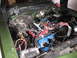 1973 Ford Ranchero - Engine bay details with a blue painted engine block and visible components like the carburetor and battery.