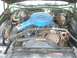 1973 Ford Ranchero - Engine bay of a 1973 Ford Ranchero, showing the air cleaner and fan shroud.