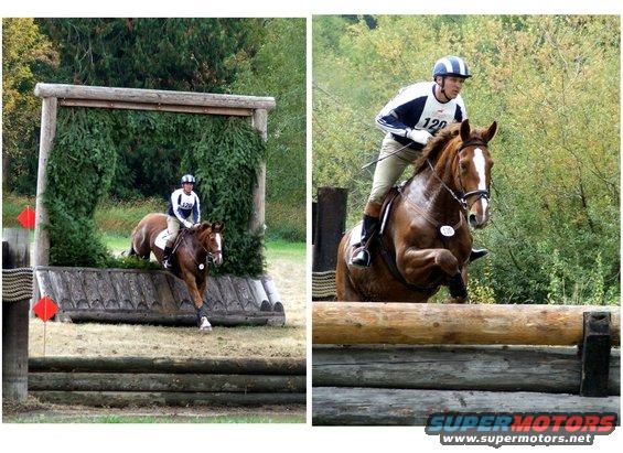 Horse and rider jump over a large wooden obstacle during an equestrian event