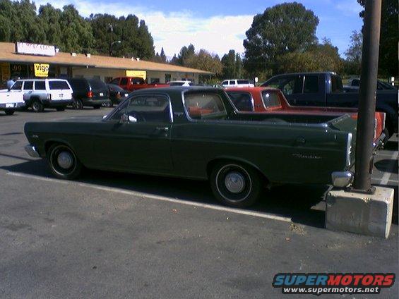 Dark green 1973 Ford Ranchero parked in a lot