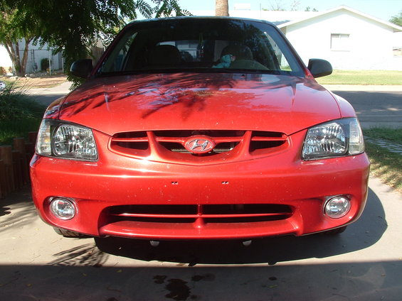 Red 2000 Hyundai Accent front view