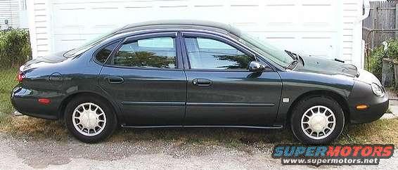 side1.jpg Note the black third window.  Guess that's my "signature" now -- did it to my Tempo too.