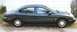 1998 Ford Taurus - Note the black third window. Guess that's my "signature" now -- did it to my Tempo too.