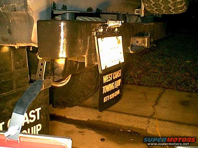 licenseplatelight.jpg Here is a side view of the new mount and light.