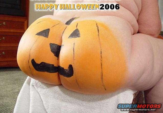 Pumpkins painted on skin with "HAPPY HALLOWEEN 2006" text above