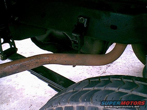 new-hanger.jpg I moved the exhaust hanger to a different spot and bent the pipe some. this was good enough for now.