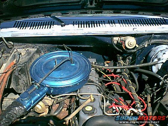 motor2-as-it-came.jpg This was how she looked when i opened the hood. i had a lifter tick and the PO bought new lifters so i thought i swap them in.