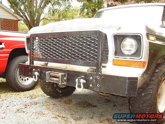 Front bumper with winch and diamond plate grille guard on a 1978 Ford Bronco