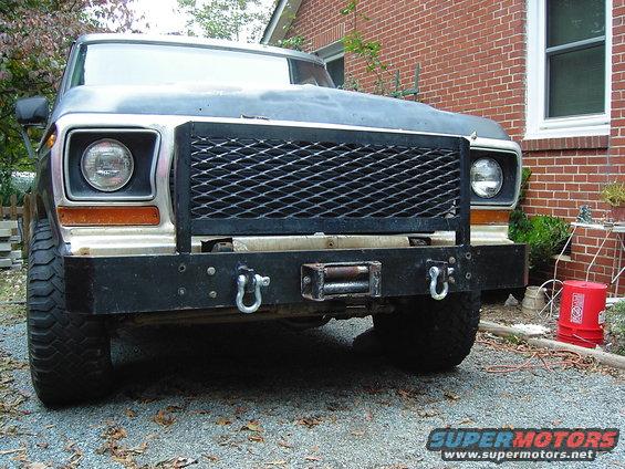 1978 Ford Bronco front end with a custom winch bumper and diamond plate grille