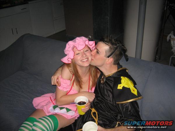Couple in costumes on a couch