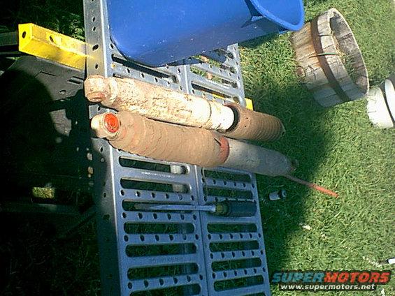 shocks-old.jpg These were still in ok condition so ai cleaned them and tossed the boots (the boots were full of crap and mud and other stinky stuff. i not use boots again. i replaced the poly mounts with now poly mounts. and they worked fine.