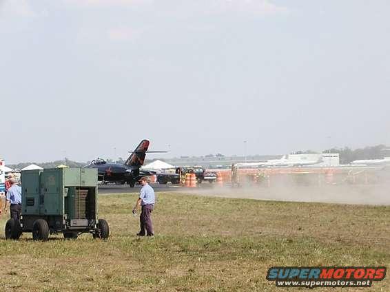 MiG-17 throttling-up to taxi to runway.  Seconds after this picture, he really poured on the power and kicked-up a huge cloud of dust and dirt.