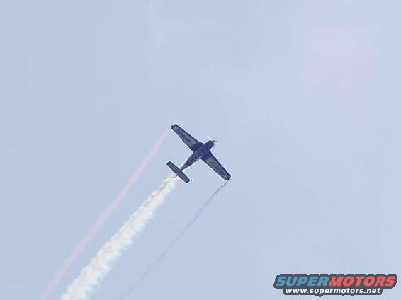 T-34 (Trainer).  Woman pilot.  Always flys to the song "God Bless America."