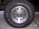 1994 Ford Bronco - Close-up of a wheel and tire, likely from an older truck or SUV.