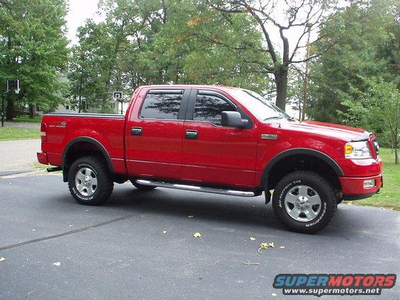 Red 2005 Ford F-150 pickup truck, 3/4 front view