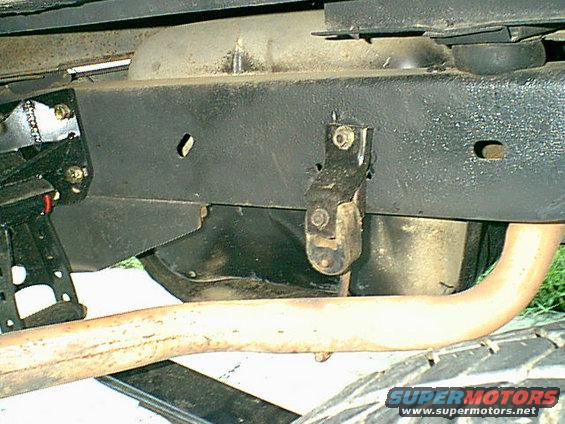 tie1.jpg Here is the new temp exhauts mount. it is the stock mount just moved up and forward to clear the spring.