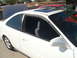 1997 Ford Probe - The 1997 Ford Probe is seen from the side with its hood open and a sunroof.