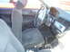 1997 Ford Probe - The interior of a car shows the driver's seat, dashboard, and center console.