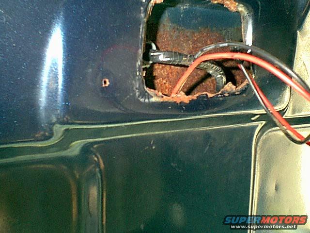 newdome3.jpg The PO chopped the stock dome light and mount. the wires were missing as well. here is the 2 power feed wires i ran. the red is door and switch lights and the black is always hot for the map lights. the other wires are for my roof lights.