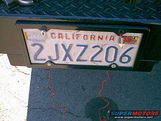 leds7.jpg I then put the LED bolts in the holes wires first.