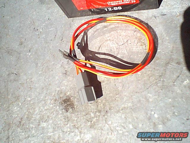 windowtester.jpg I took it out of the harness and soldered a male spade on the ends of each wire.