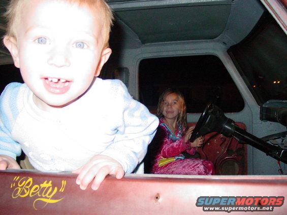 Kid in front, another kid in driver's seat. "Betty" on the dash