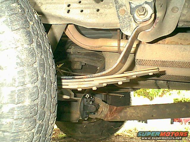 rear-leaf.jpg ok why i got this? well she was hit hard in the rear end. how hard look at the rear leaf spring and the drives shaft.