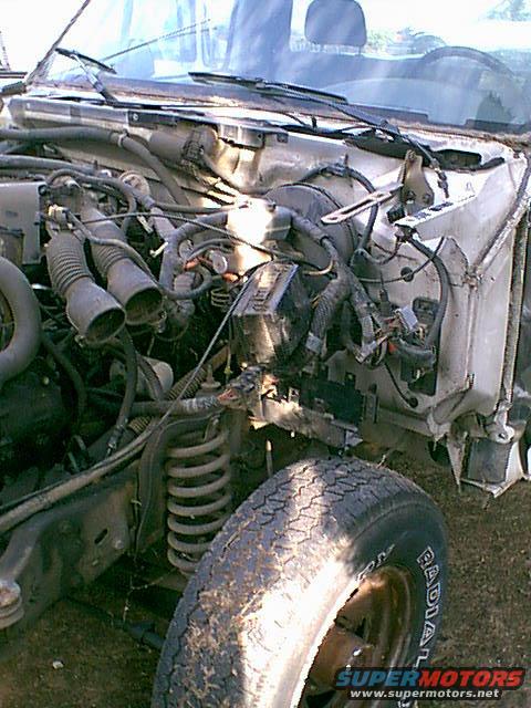 drivers-side3.jpg here is the last shot of the drivers side harness mess. now it is time to start to remove stuff.