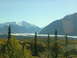 1982 Chevrolet C/K Pickup - Scenic view of mountains and a glacier under a clear blue sky.