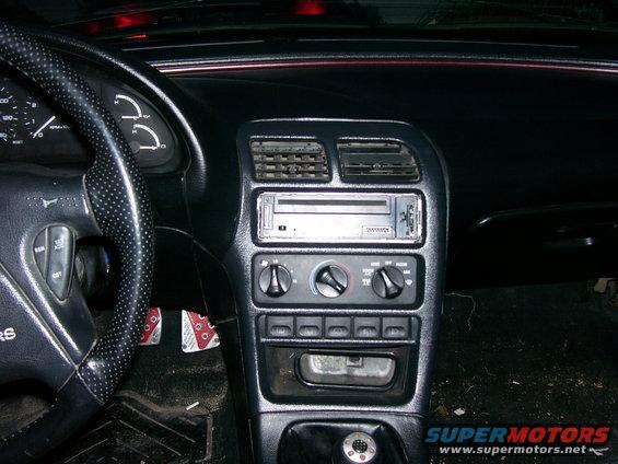 1993 Mazda MX-6 interior showing dashboard, steering wheel, and center console with radio