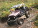 1990 Ford Bronco - This modified Toyota Land Cruiser FJ40 navigates a challenging off-road course.