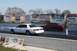 1997 Mercury Grand Marquis - Two sedans are lined up on a drag strip, with advertising banners in the background.