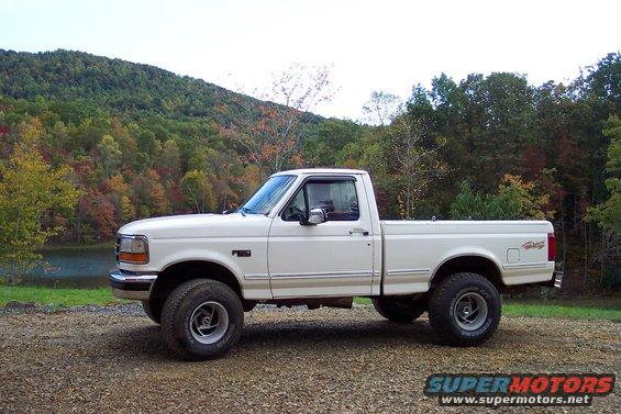 100_0961.jpg Drivers side view, about a week after I got the truck, in this picture it has 2 new back tires. I have removed all the chrome trim from the side of the truck since this.