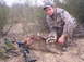 2005 BMW 3 Series - A hunter poses with a raccoon that was taken with a bow and arrow.